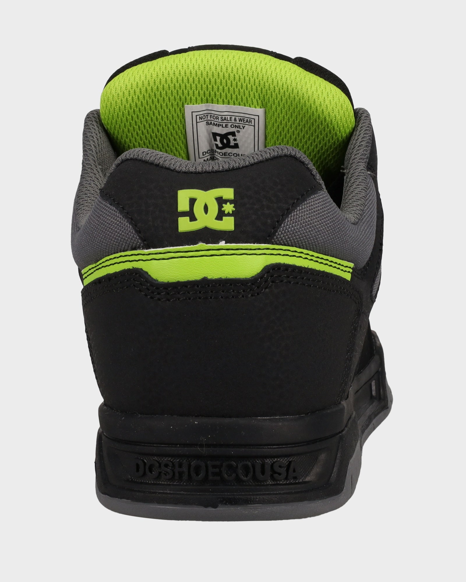 black and lime green dc shoes